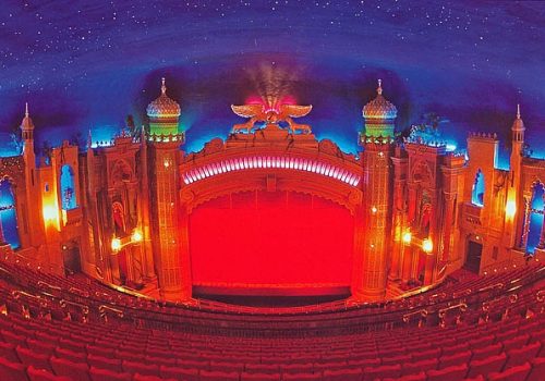 The Elevating Theatre Stage in front of the stage’s closed curtain is fully lowered